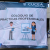 Lona colgada entre los edificios con la imagen de dos alumnos en caricatura haciendo presentación